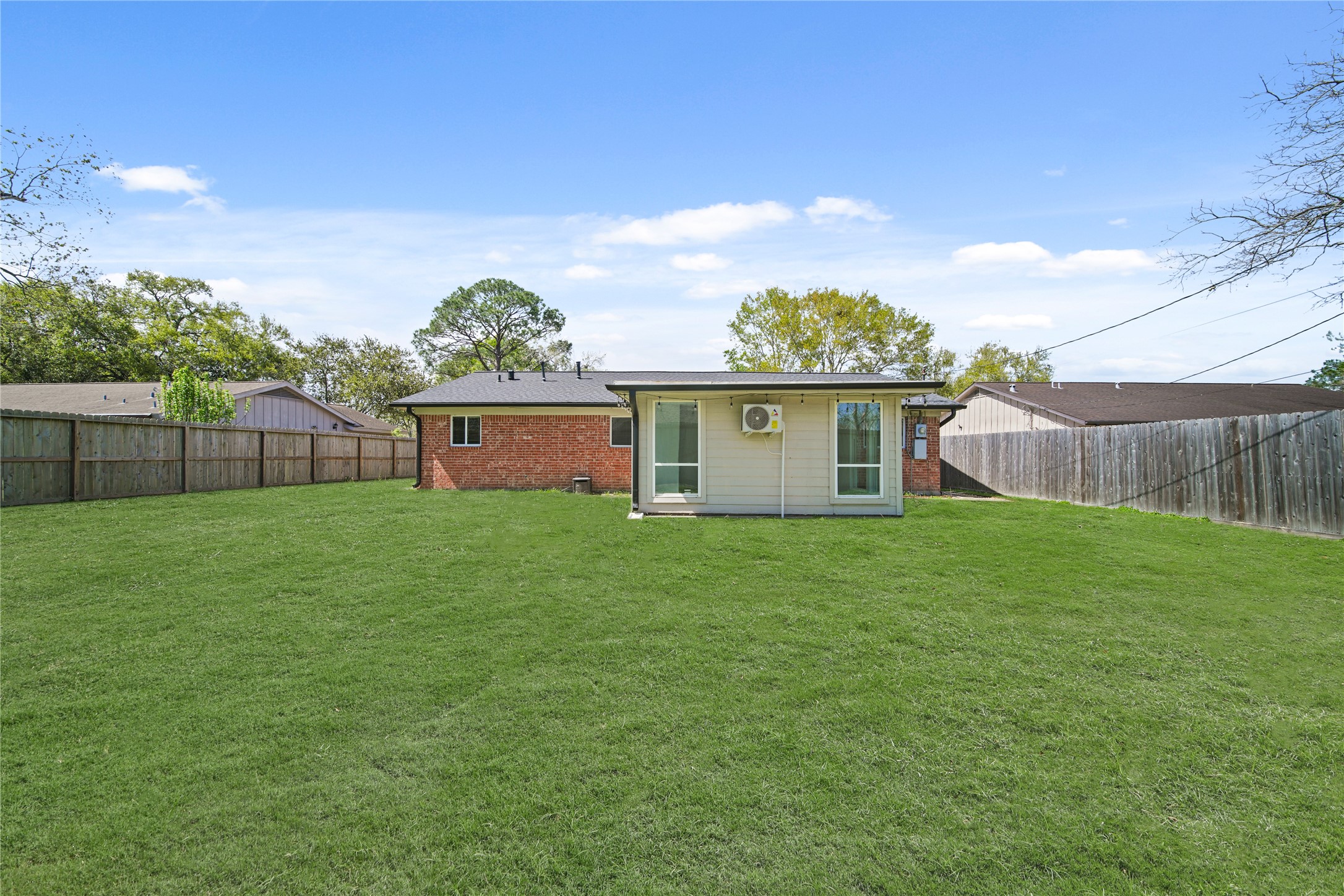 303 Rachael Lane Friendswood, TX 77546 - Photo 13 of 15 Large backyard perfect for kids to play or gatherings.