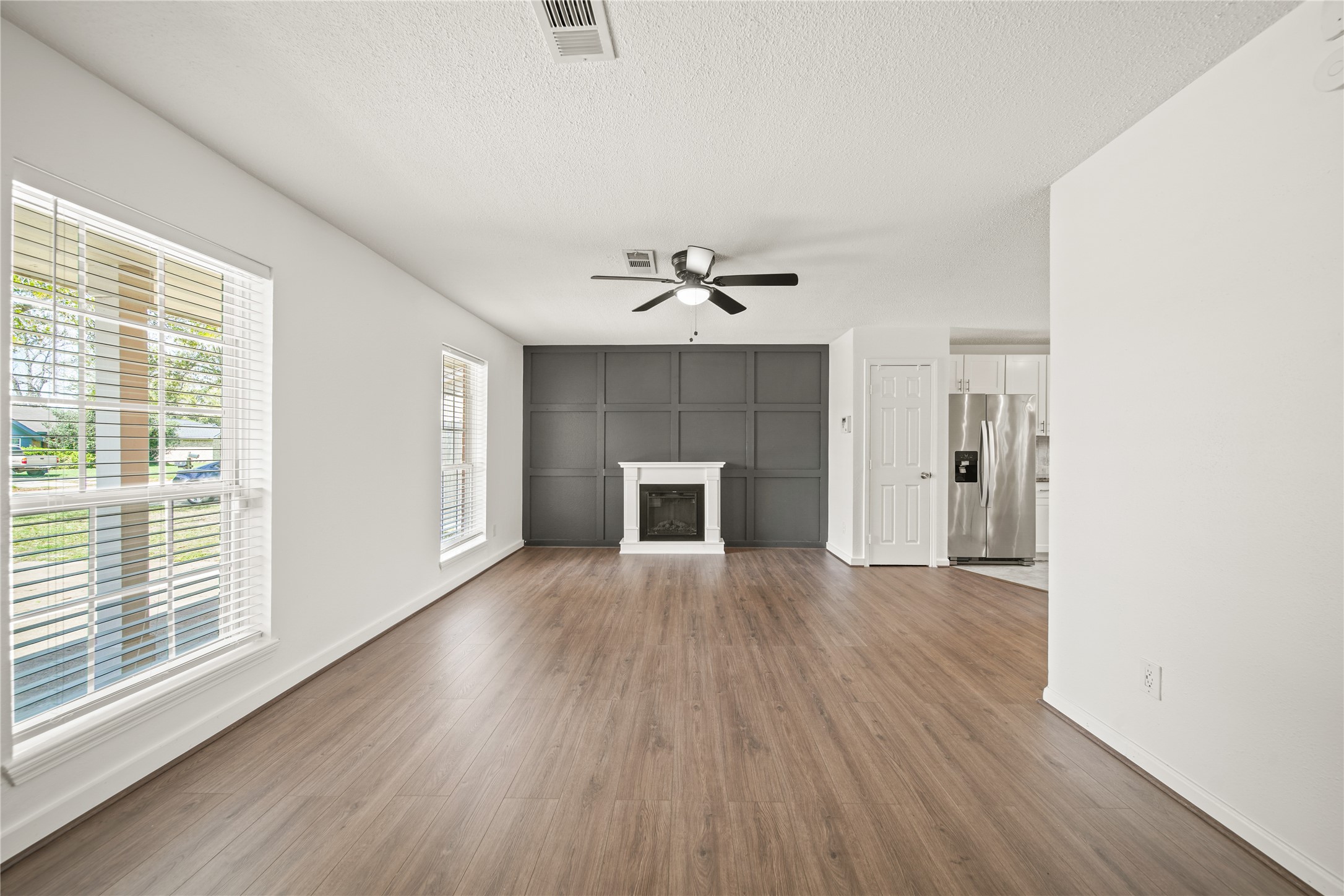 303 Rachael Lane Friendswood, TX 77546 - Photo 3 of 15 Open-Concept living area with windows that allow lot's of natural light.
