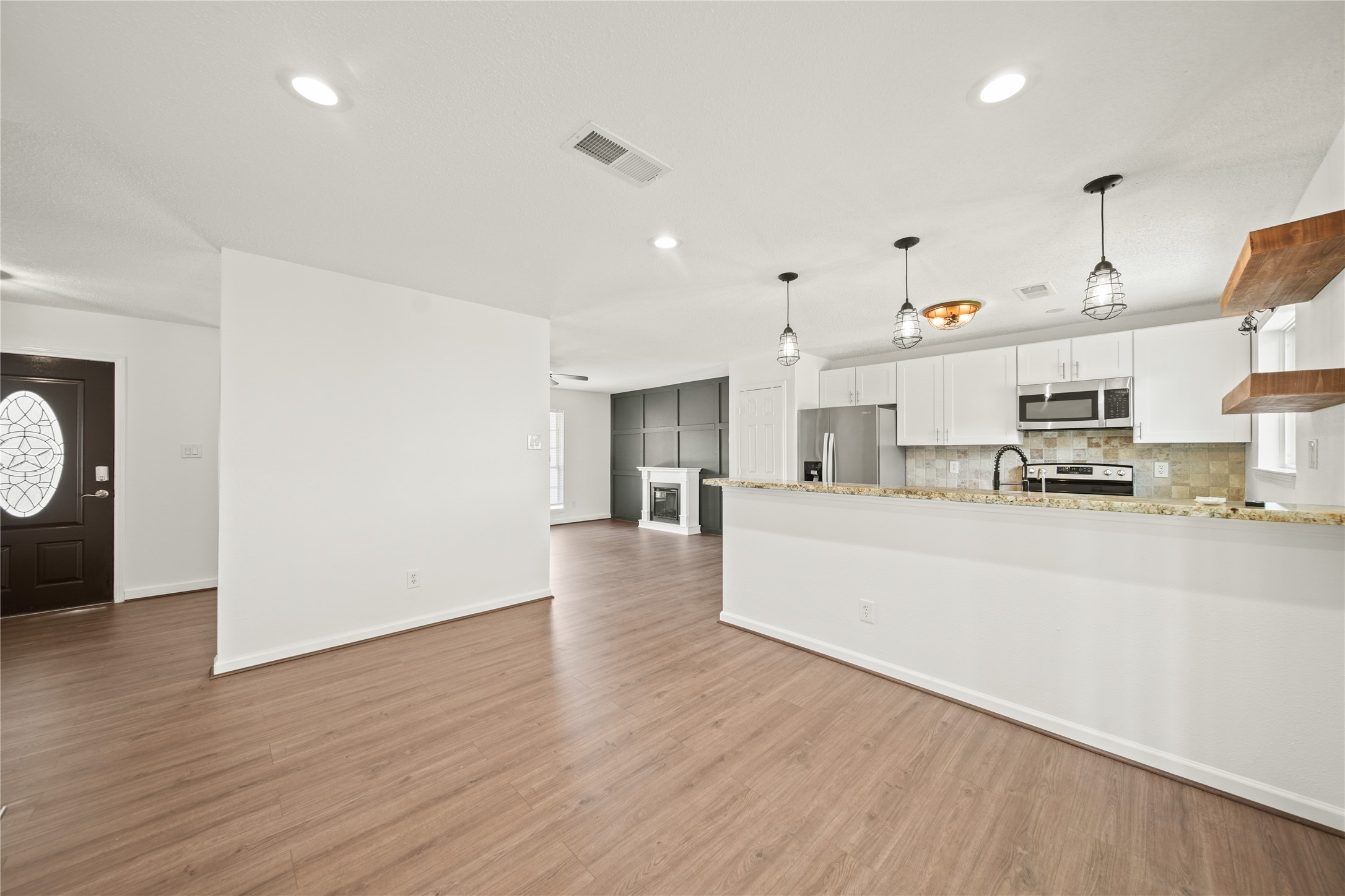 303 Rachael Lane Friendswood, TX 77546 - Photo 6 of 15 Another view of the dining room, open concept to the kithcen.