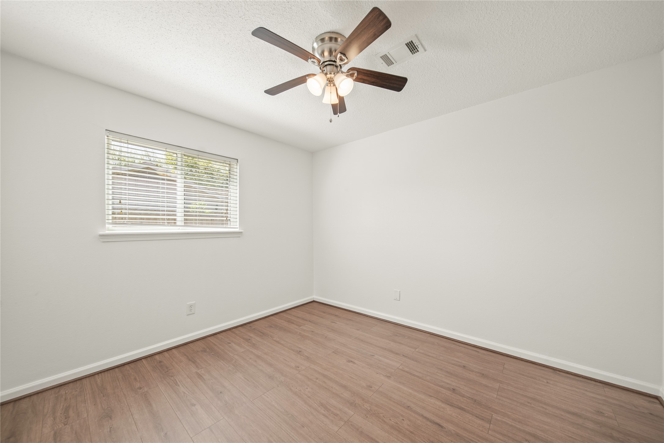 303 Rachael Lane Friendswood, TX 77546 - Photo 9 of 15 View of second bedroom.