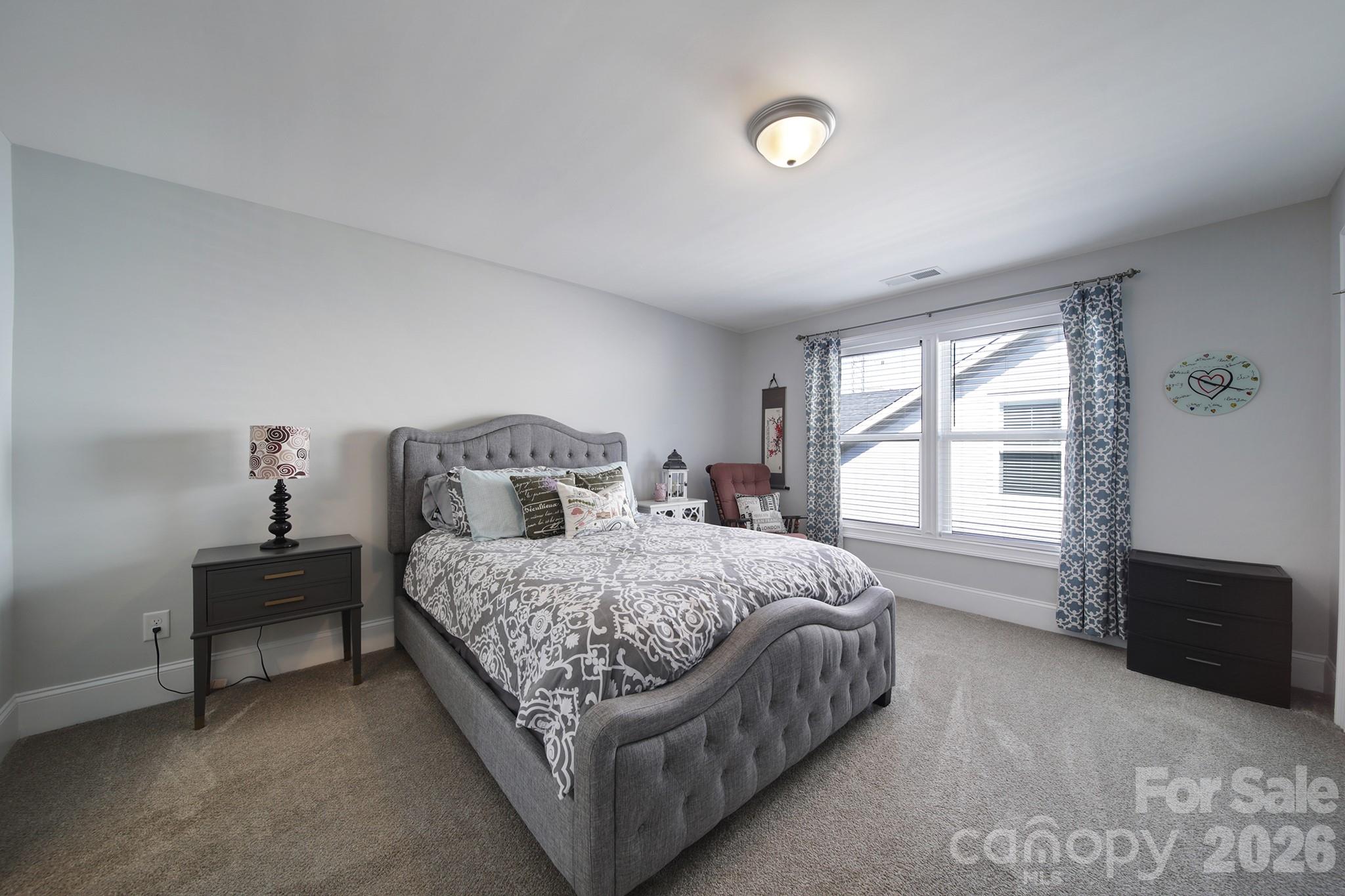 1633 Half Pint Loop Fort Mill, SC 29708 - Photo 24 of 48 a bedroom with a bed and a window