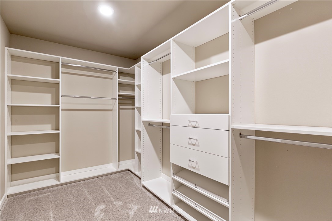 4411 236th Place Southeast Bothell, WA 98021 - Photo 18 of 31 a view of an empty walk in closet