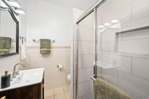 a bathroom with a sink and mirror