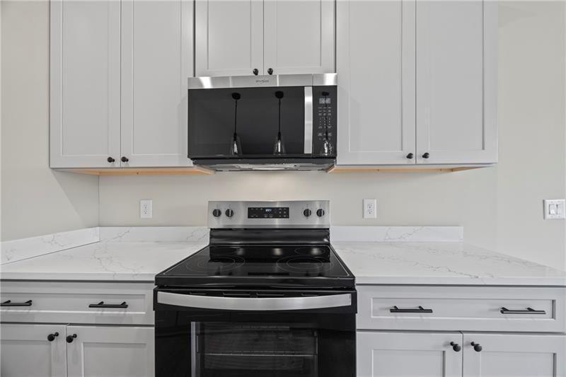 693 Racetrack Road Toccoa, GA 30577 - Photo 19 of 45 a stove top oven sitting inside of a kitchen