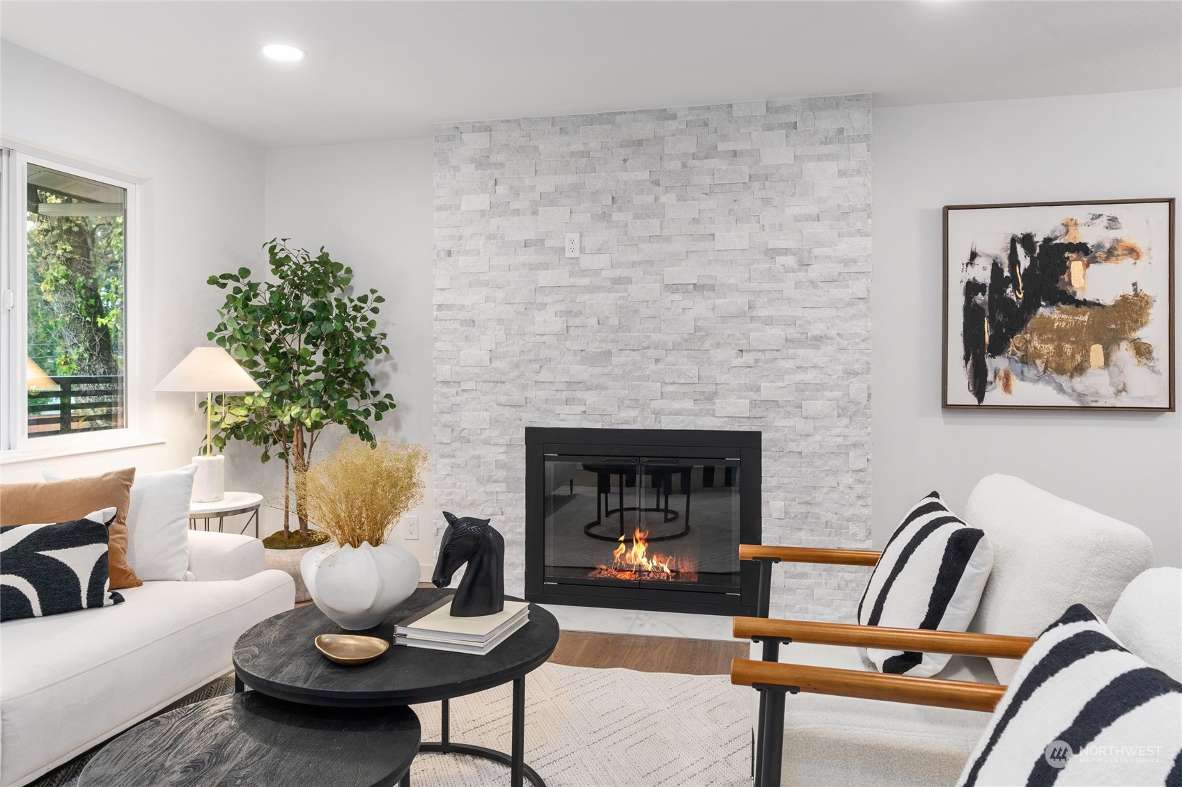 1256 Birch Street Edmonds, WA 98020 - Photo 11 of 37 a living room with furniture and a fireplace