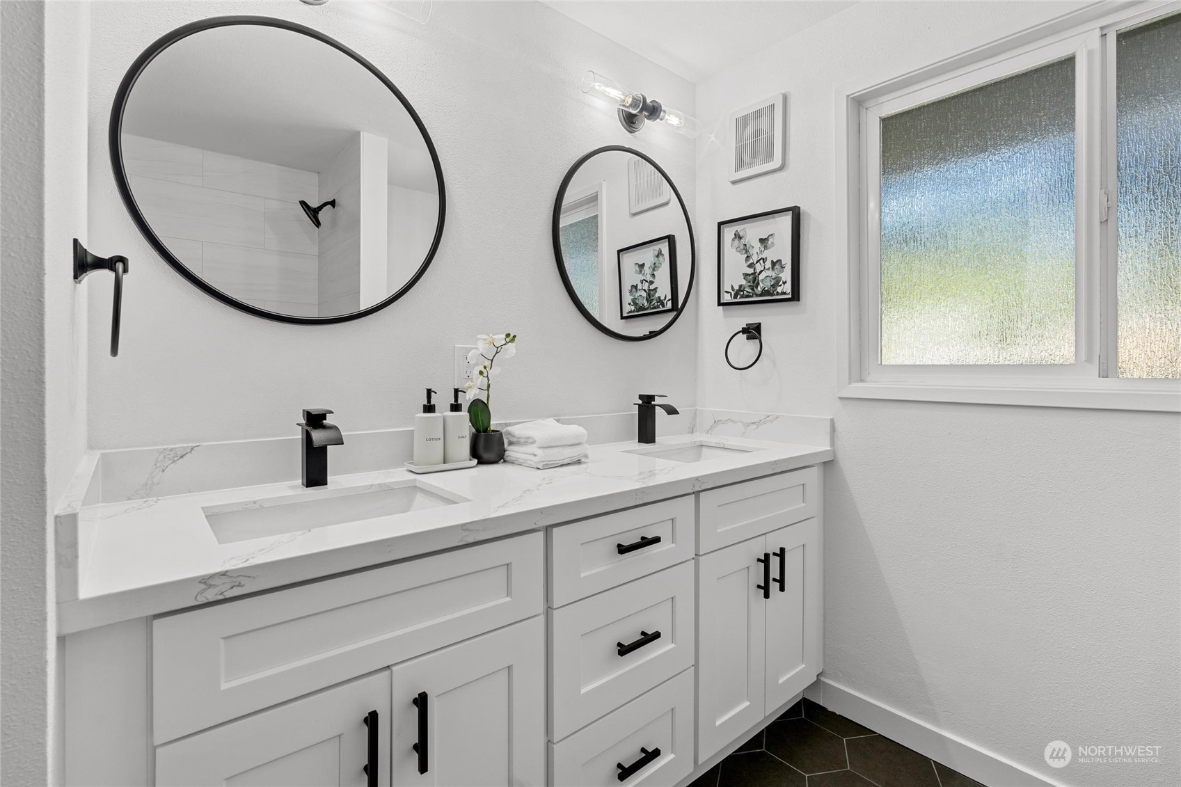 1256 Birch Street Edmonds, WA 98020 - Photo 13 of 37 a bathroom with a sink and a mirror