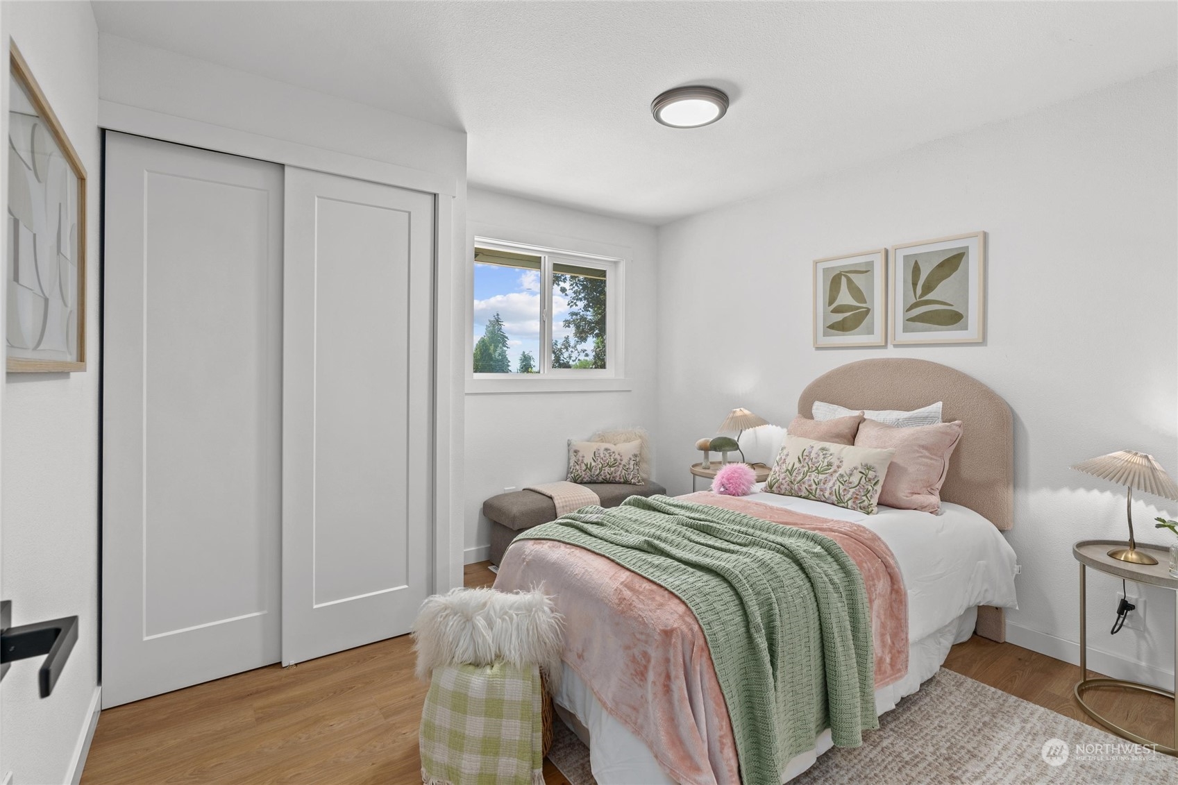 1256 Birch Street Edmonds, WA 98020 - Photo 14 of 37 a bedroom with a bed and a painting on the wall