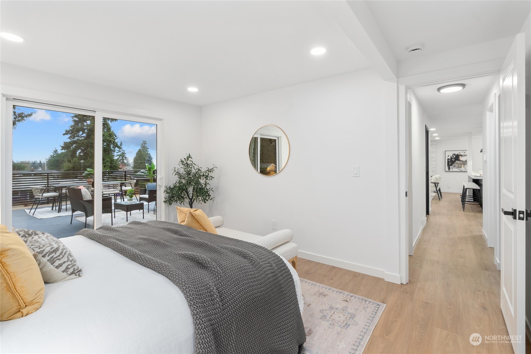 1256 Birch Street Edmonds, WA 98020 - Photo 16 of 37 a bedroom with a large bed and a large window