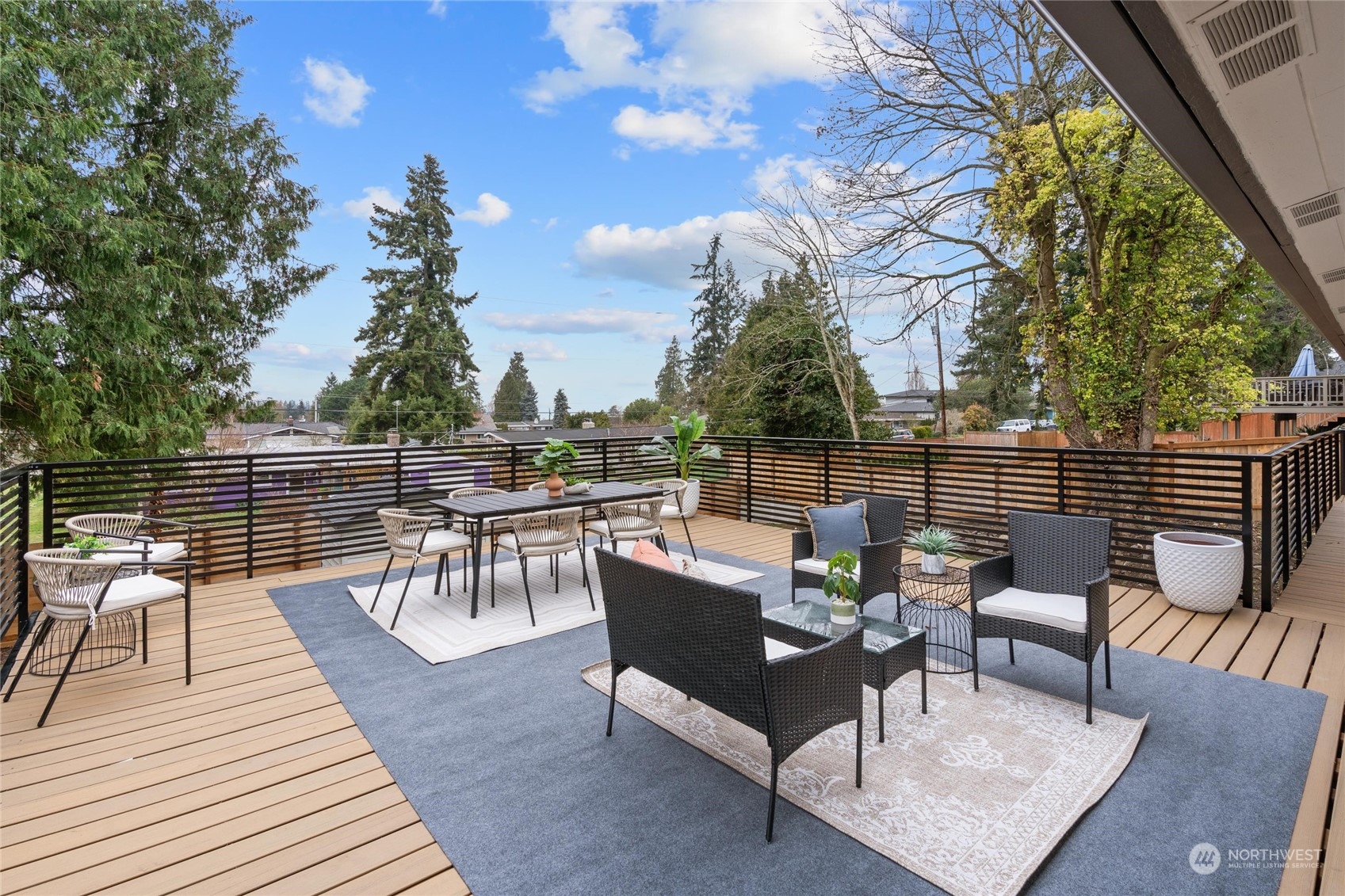 1256 Birch Street Edmonds, WA 98020 - Photo 21 of 37 a view of a terrace with seating area and wooden floor