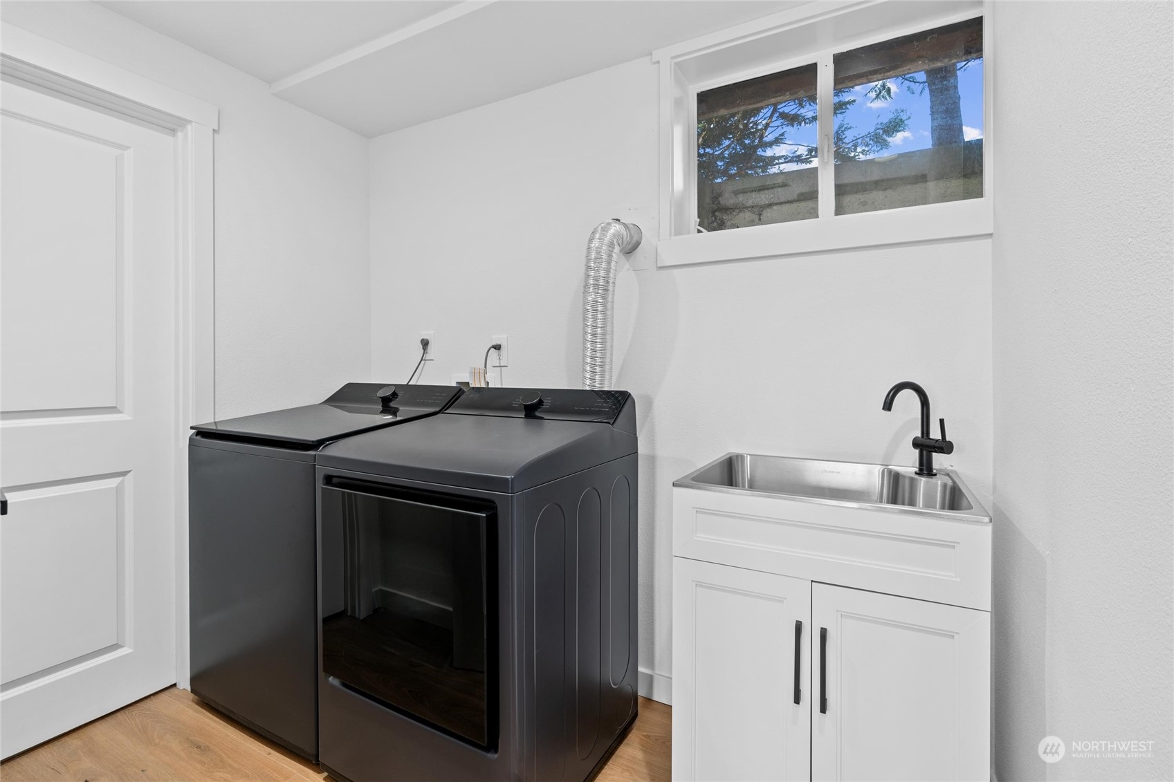1256 Birch Street Edmonds, WA 98020 - Photo 28 of 37 a utility room with dryer and washer