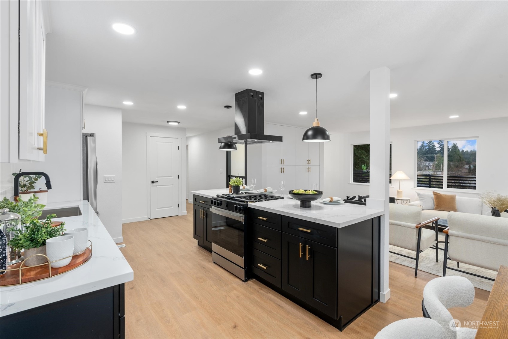 1256 Birch Street Edmonds, WA 98020 - Photo 6 of 37 a kitchen with stainless steel appliances kitchen island sink stove and living room
