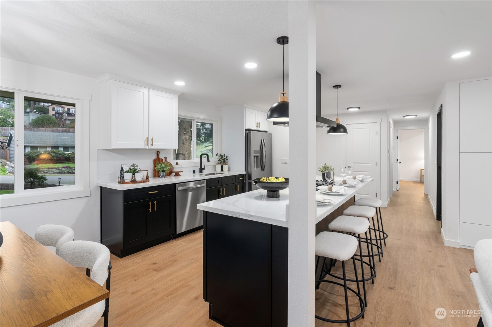 1256 Birch Street Edmonds, WA 98020 - Photo 7 of 37 a kitchen with sink refrigerator dining table and chairs
