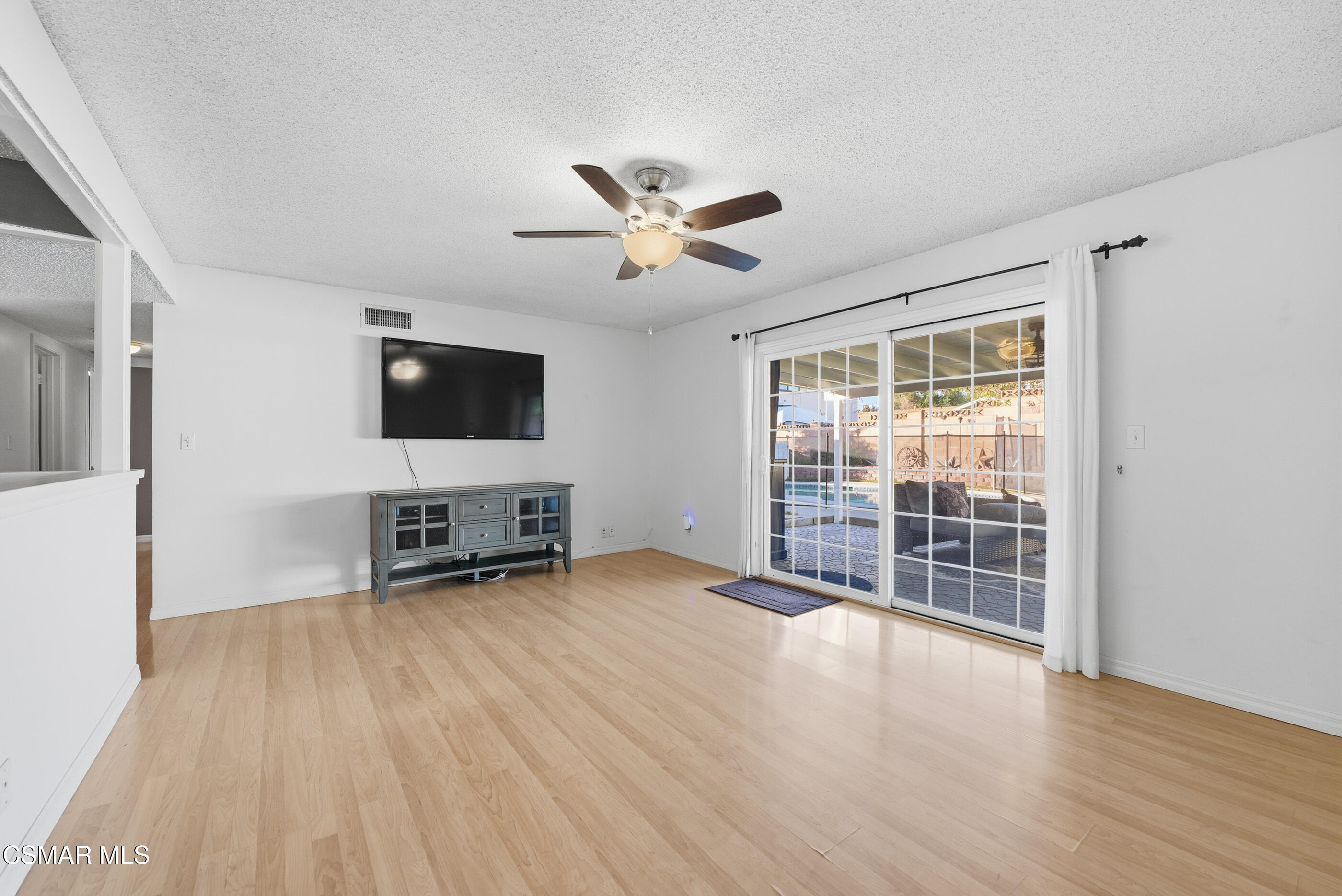 2267 Morley Street Simi Valley, CA 93065 - Photo 13 of 35 a view of a livingroom with furniture and a flat screen tv