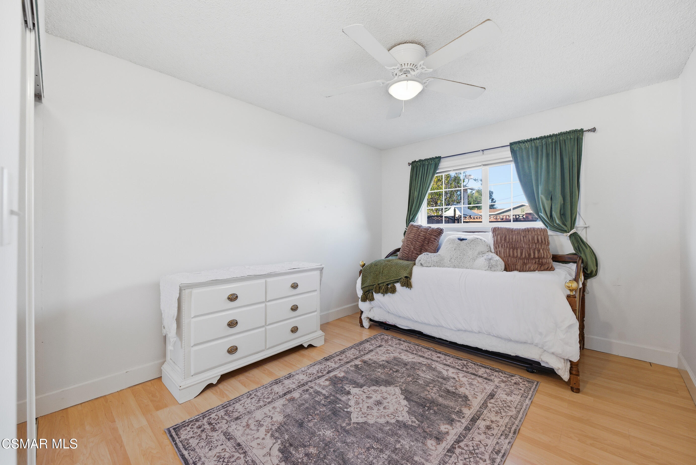 2267 Morley Street Simi Valley, CA 93065 - Photo 19 of 35 a room with furniture and a baby crib