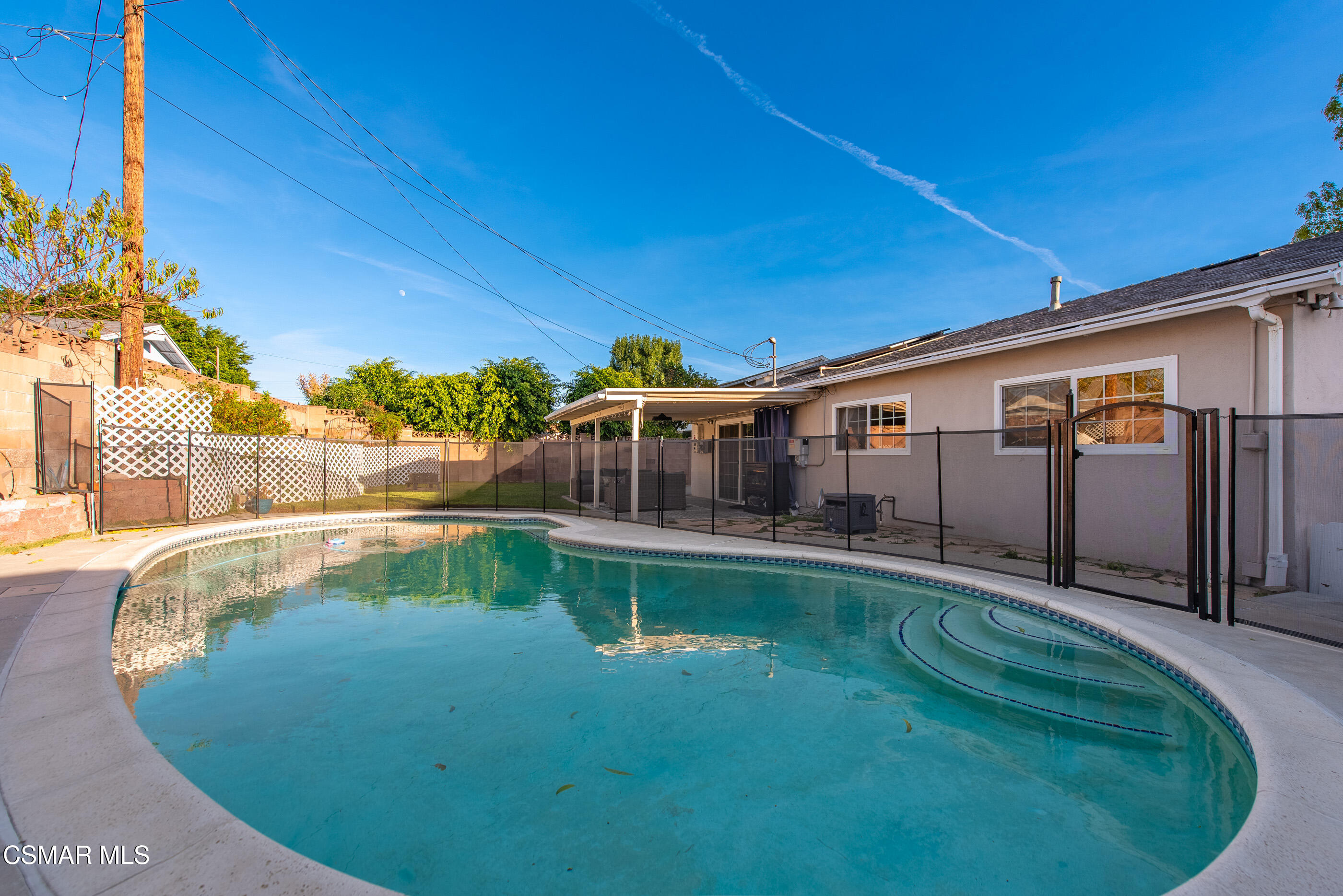 2267 Morley Street Simi Valley, CA 93065 - Photo 26 of 35 a view of a house with pool fire pit next to a yard