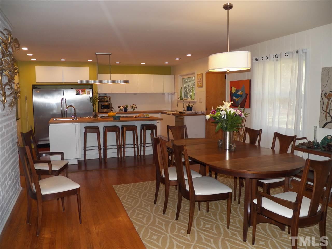 212 Bayleaf Drive Raleigh, NC 27615 - Photo 11 of 25 a view of a dining room with furniture