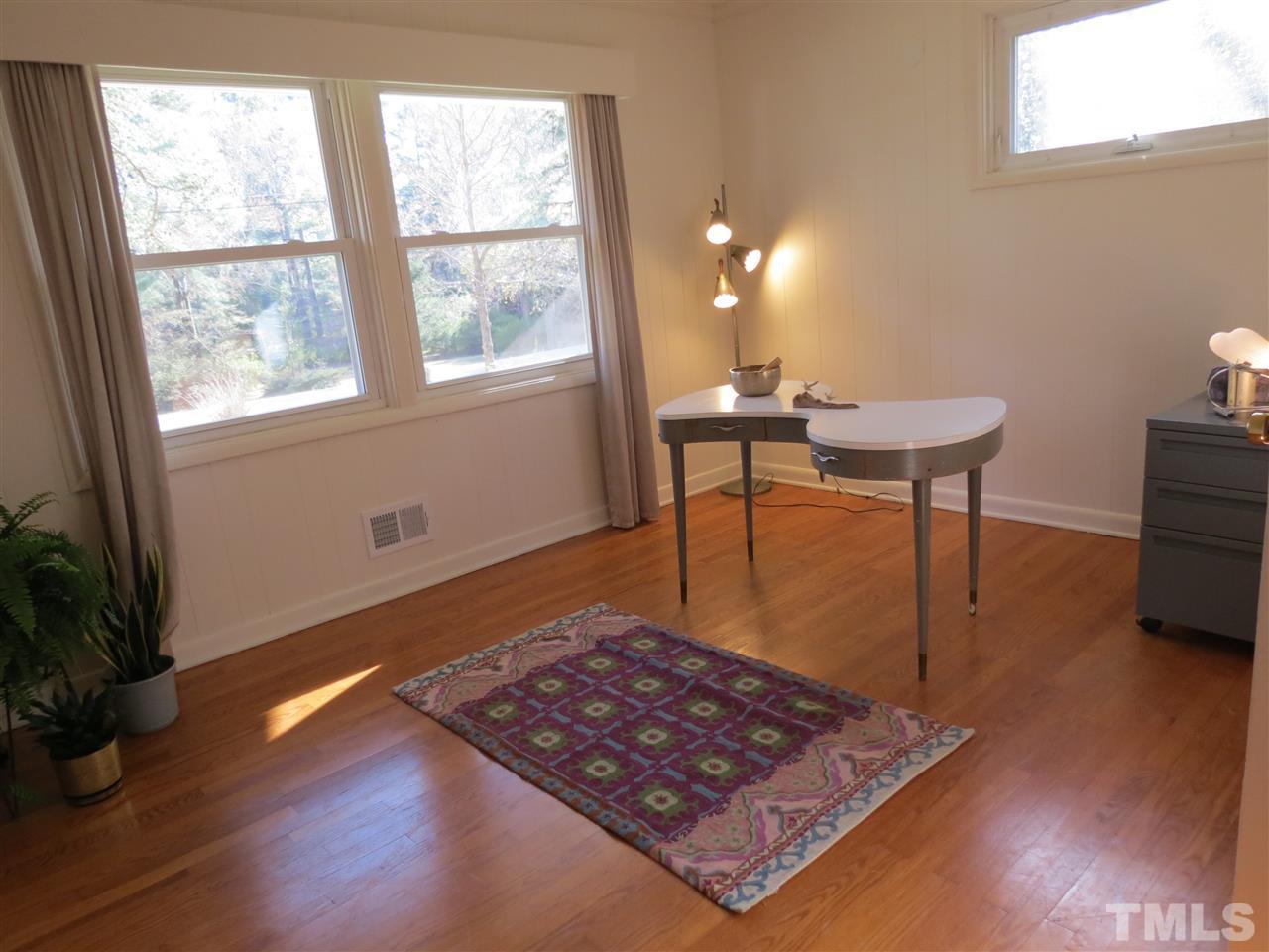 212 Bayleaf Drive Raleigh, NC 27615 - Photo 12 of 25 a view of a workspace with furniture and a window