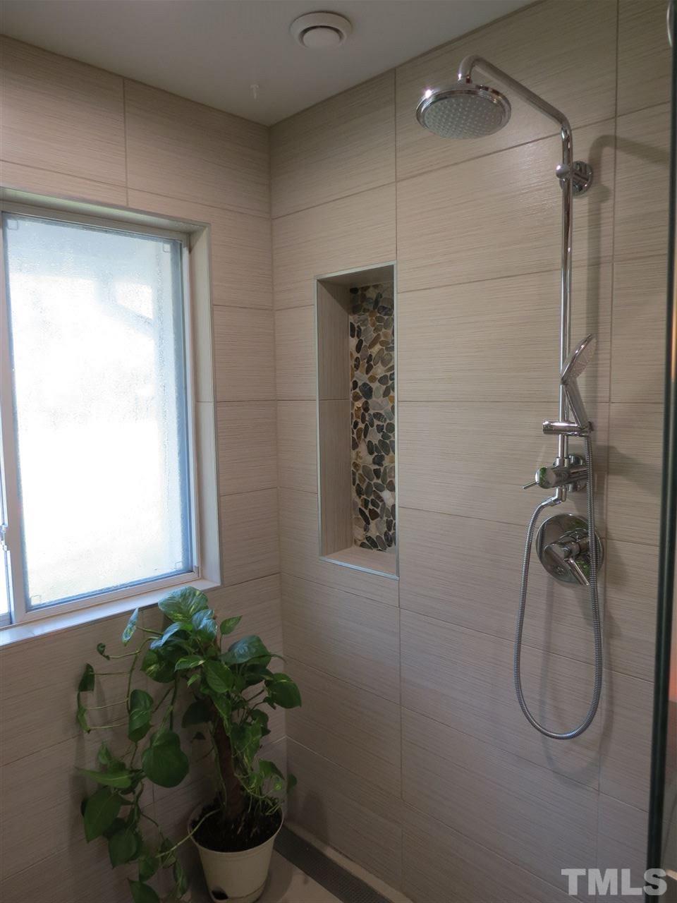 212 Bayleaf Drive Raleigh, NC 27615 - Photo 15 of 25 a bathroom with a shower