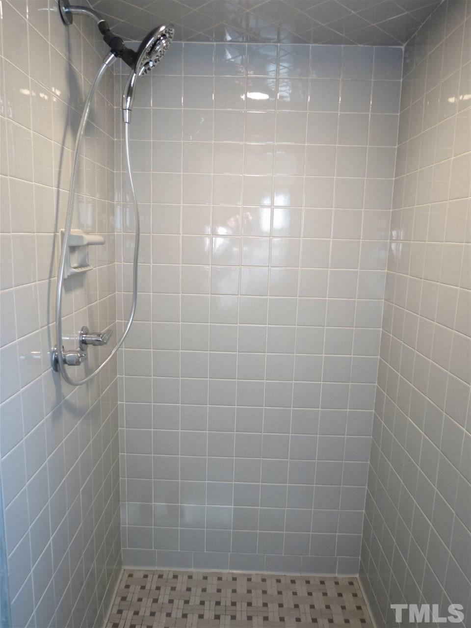 212 Bayleaf Drive Raleigh, NC 27615 - Photo 19 of 25 a bathroom with a shower
