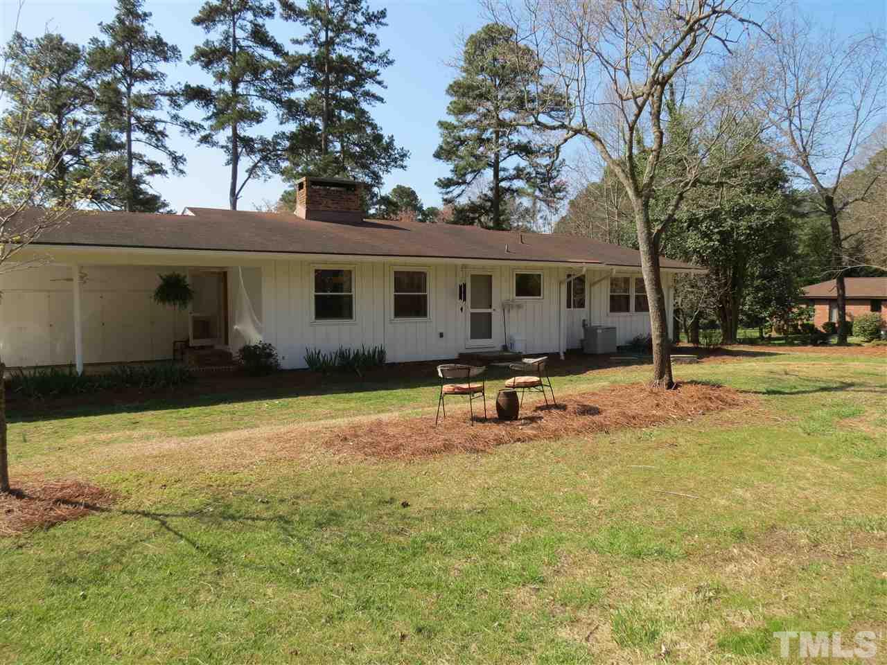 212 Bayleaf Drive Raleigh, NC 27615 - Photo 23 of 25 a view of a house with swimming pool and sitting area