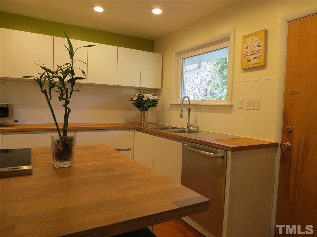 212 Bayleaf Drive Raleigh, NC 27615 - Photo 9 of 25 a view of a kitchen with a sink