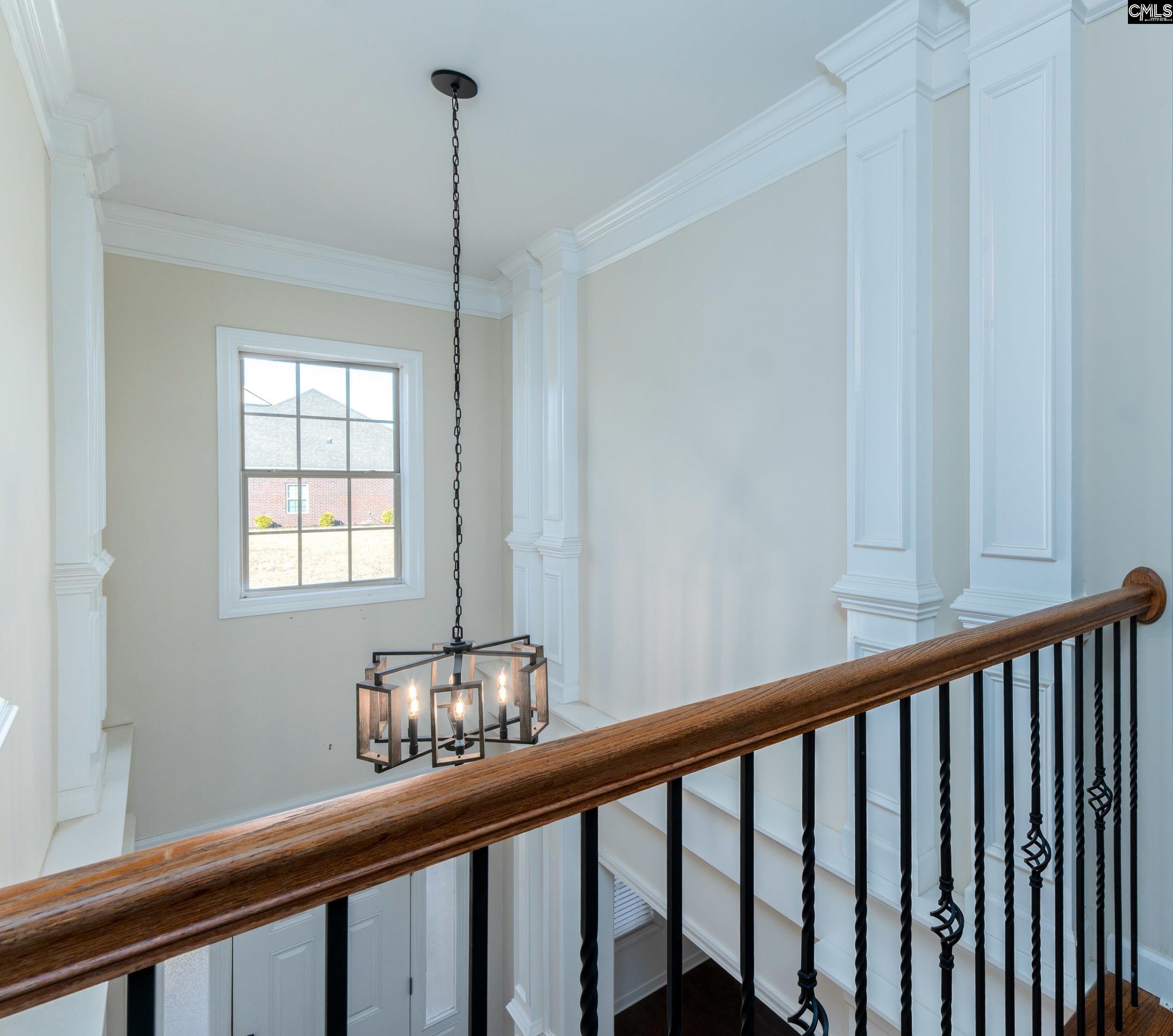 40 Wading Bird Loop Blythewood, SC 29016 - Photo 14 of 26 a view of a balcony with furniture
