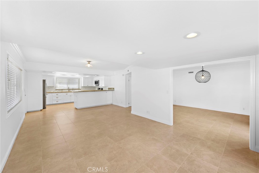 35491 Del Rey Dana Point, CA 92624 - Photo 12 of 48 a view of a kitchen with a refrigerator and a sink