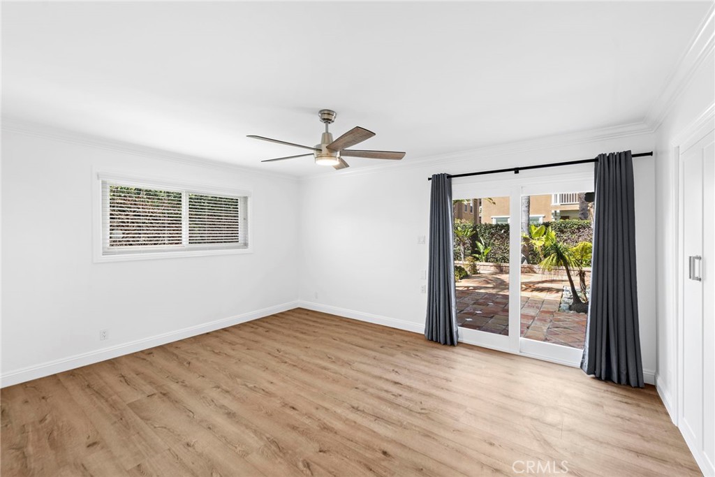 35491 Del Rey Dana Point, CA 92624 - Photo 14 of 48 a view of empty room with wooden floor and fan