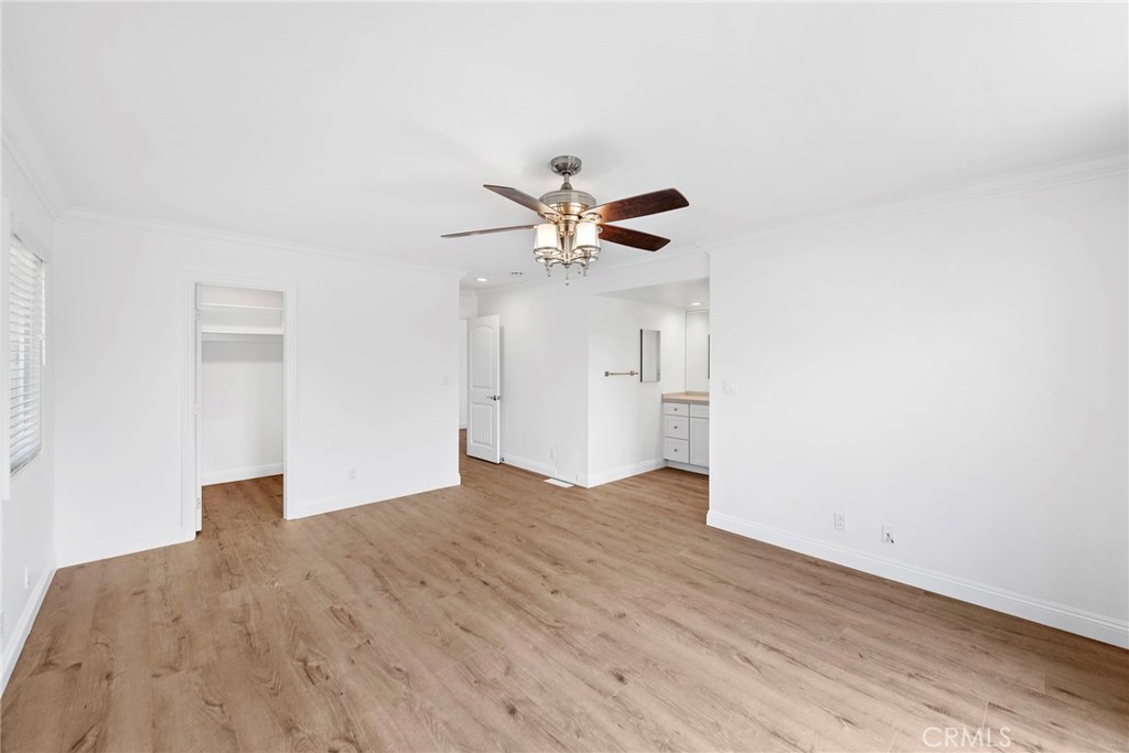 35491 Del Rey Dana Point, CA 92624 - Photo 22 of 48 an empty room with wooden floor and ceiling fan
