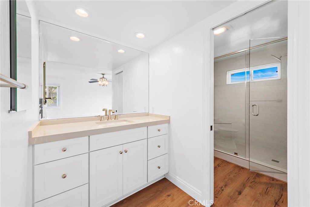 35491 Del Rey Dana Point, CA 92624 - Photo 23 of 48 a bathroom with a shower sink and mirror