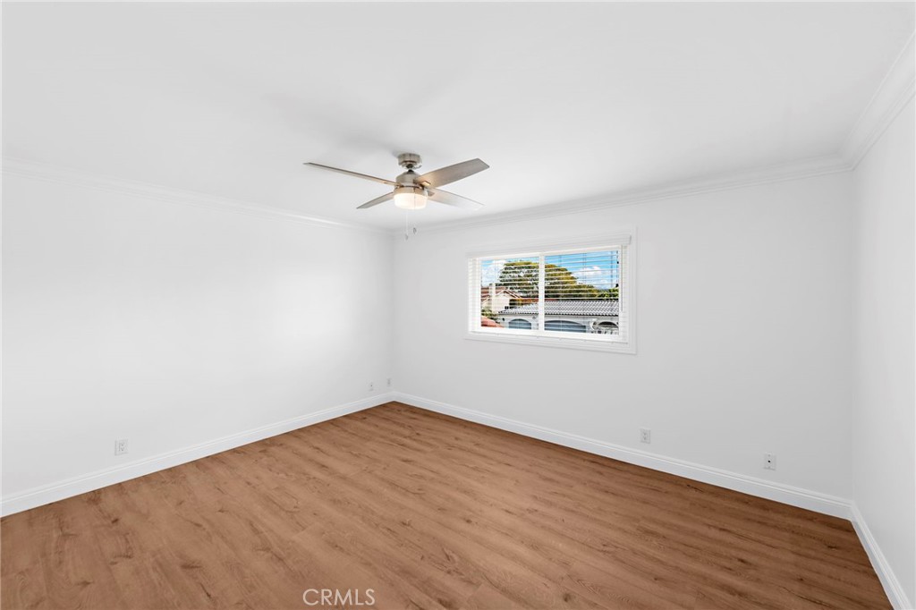 35491 Del Rey Dana Point, CA 92624 - Photo 28 of 48 an empty room with wooden floor window and ceiling fan
