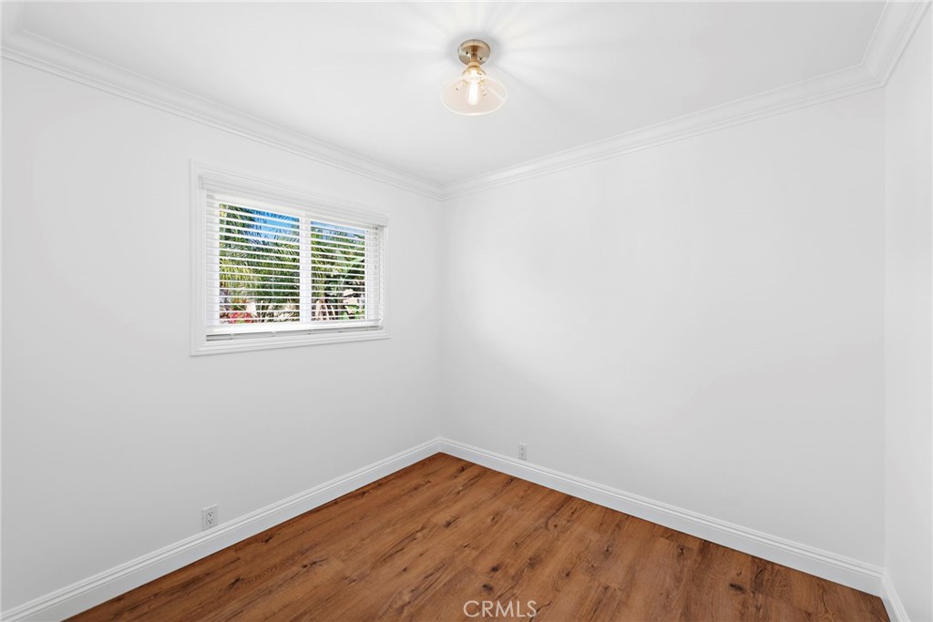 35491 Del Rey Dana Point, CA 92624 - Photo 30 of 48 a view of an empty room with wooden floor and a window