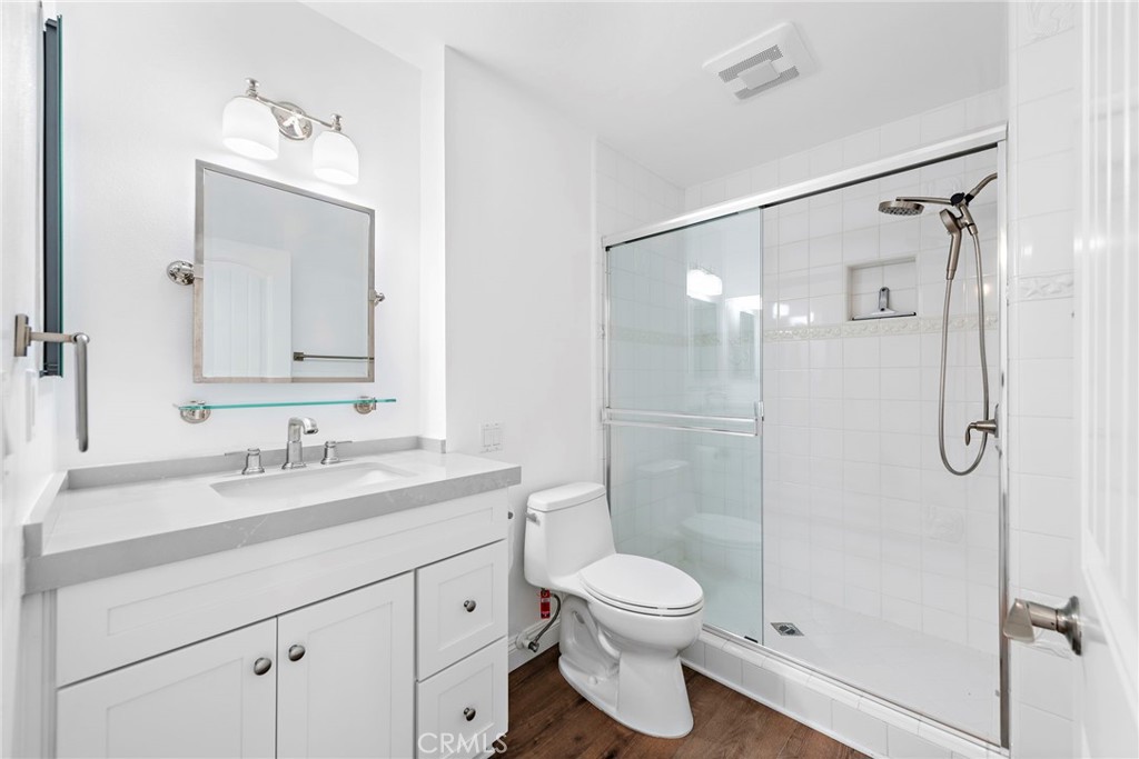 35491 Del Rey Dana Point, CA 92624 - Photo 31 of 48 a bathroom with a sink a toilet and shower