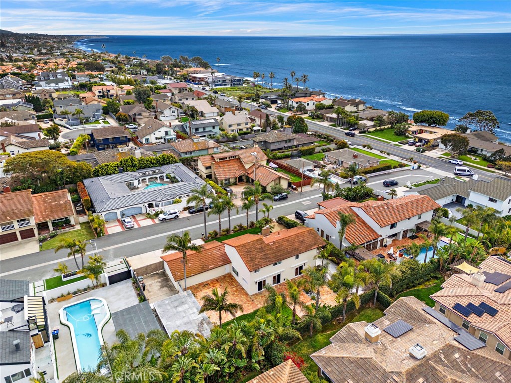 35491 Del Rey Dana Point, CA 92624 - Photo 40 of 48 an aerial view of a city with lots of residential buildings and ocean view in back