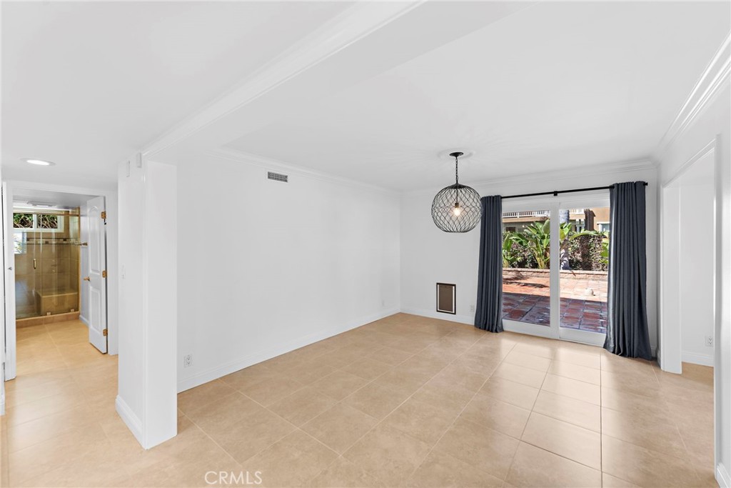 35491 Del Rey Dana Point, CA 92624 - Photo 7 of 48 a view of a big room with wooden floor windows and cabinet