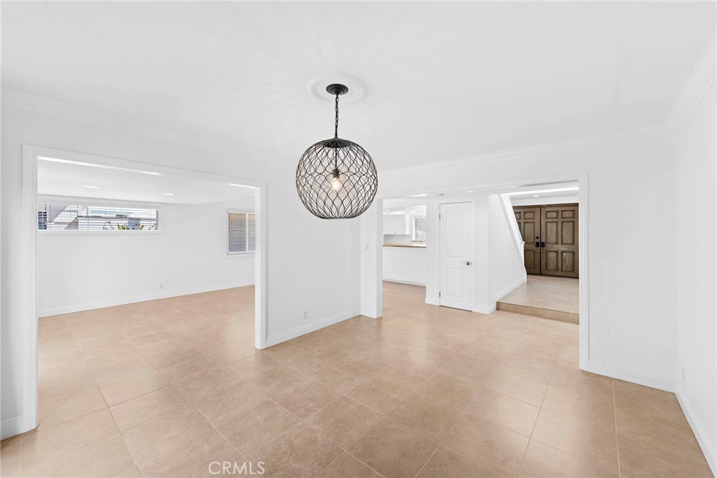 35491 Del Rey Dana Point, CA 92624 - Photo 8 of 48 a view of an empty room with a window and kitchen view