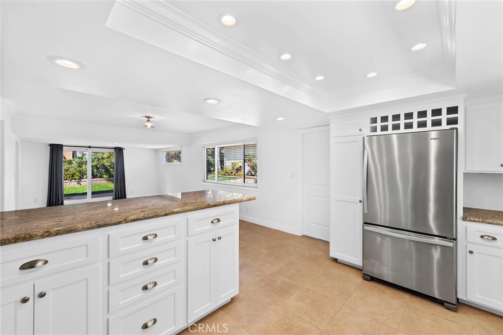 35491 Del Rey Dana Point, CA 92624 - Photo 10 of 48 a kitchen with granite countertop cabinets and stainless steel appliances