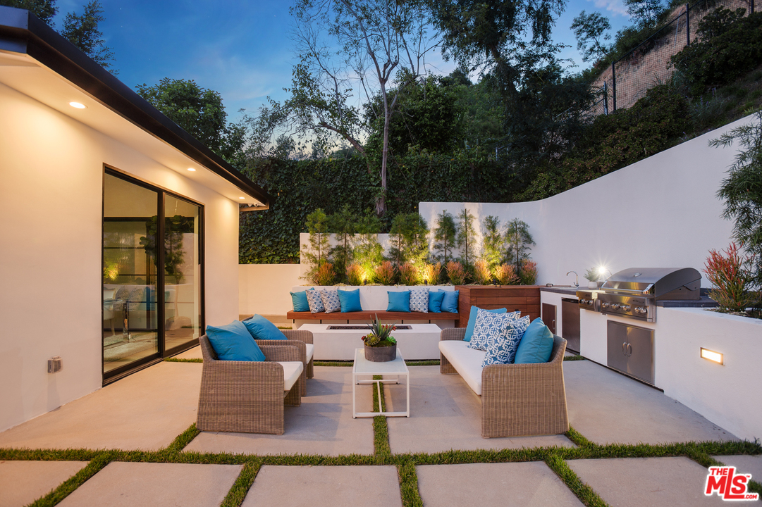 2084 Roscomare Road Los Angeles, CA 90077 - Photo 21 of 22 swimming pool view with seating space