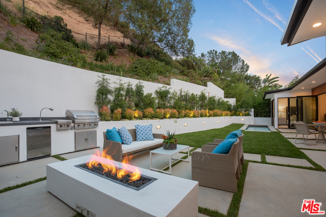 2084 Roscomare Road Los Angeles, CA 90077 - Photo 22 of 22 a view of outdoor space yard and patio