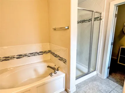 a bathroom with a bath tub