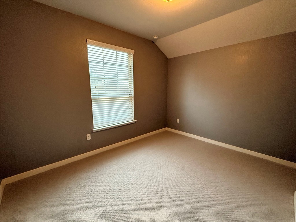 7216 Sienna Rouge Path Austin, TX 78744 - Photo 17 of 37 an empty room with a window