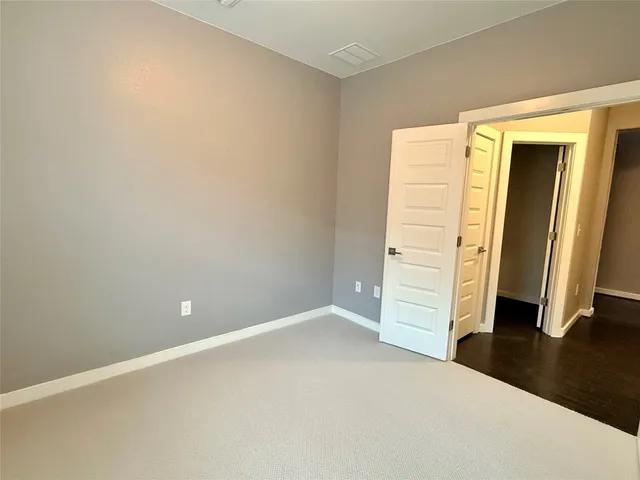 an empty room with closet