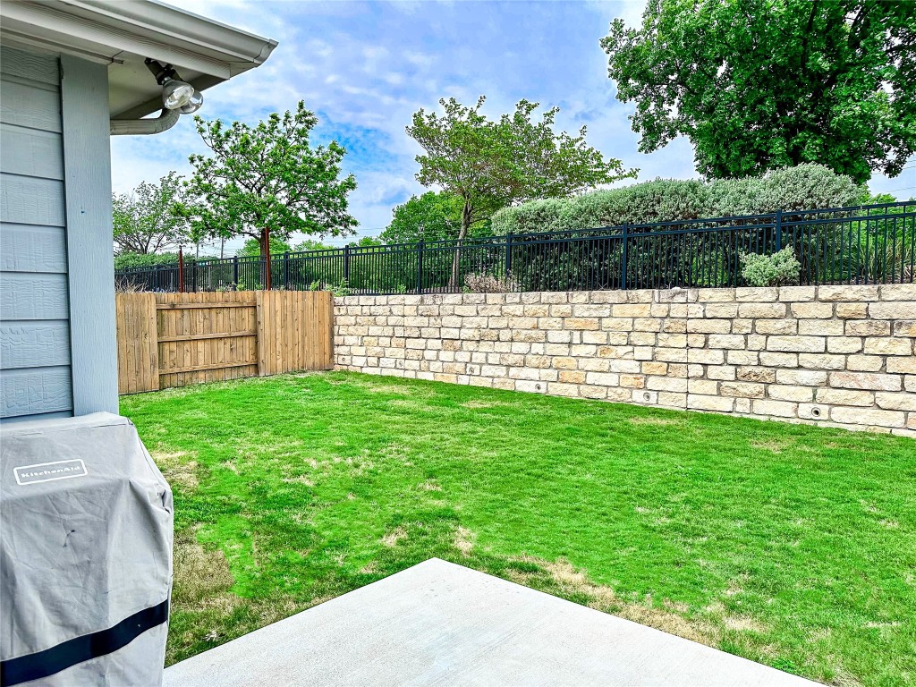 7216 Sienna Rouge Path Austin, TX 78744 - Photo 25 of 37 a view of outdoor space with garden