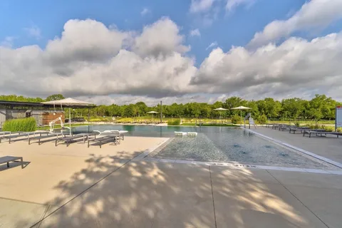 a view of a lake with a city