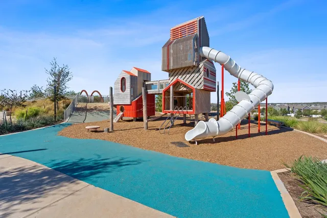 a view of a park with slide