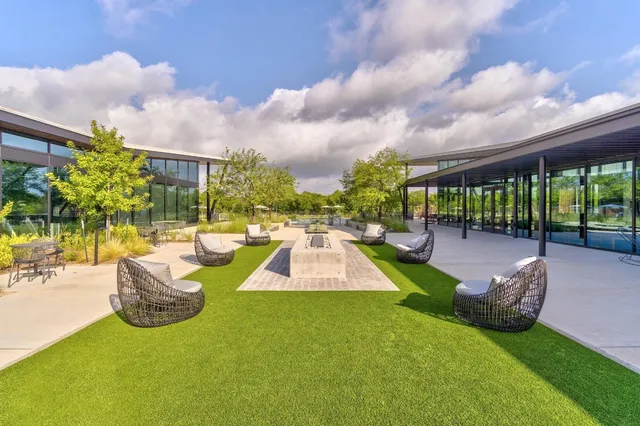 a view of a swimming pool with a garden