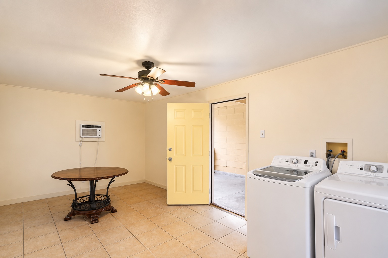 1508 Walnut Street Georgetown, TX 78626 - Photo 29 of 37 Functional laundry space with a light-filled entry, ready for daily tasks.