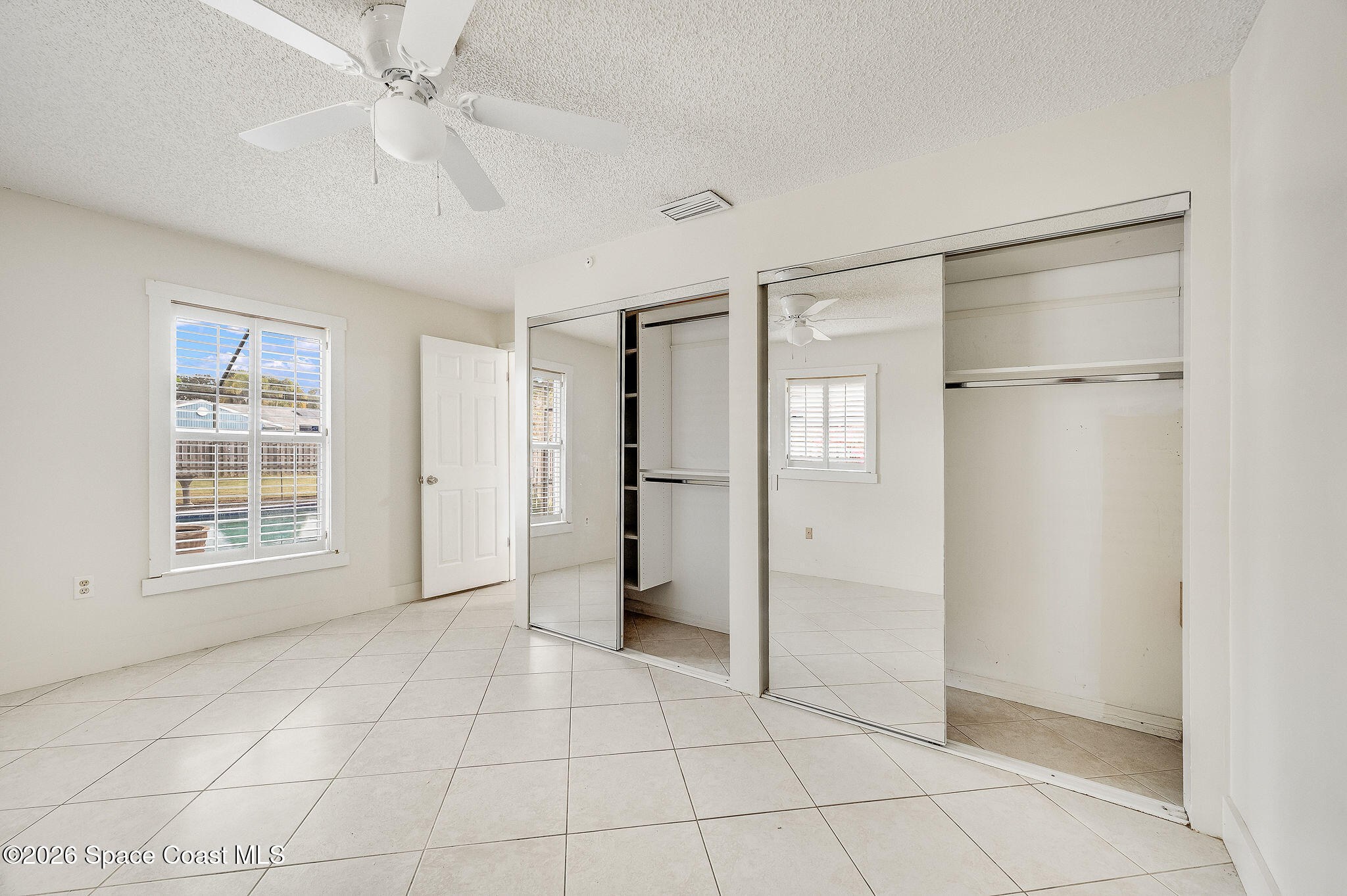 2623 Reed Avenue Melbourne, FL 32901 - Photo 23 of 45 a view of an empty room with a window