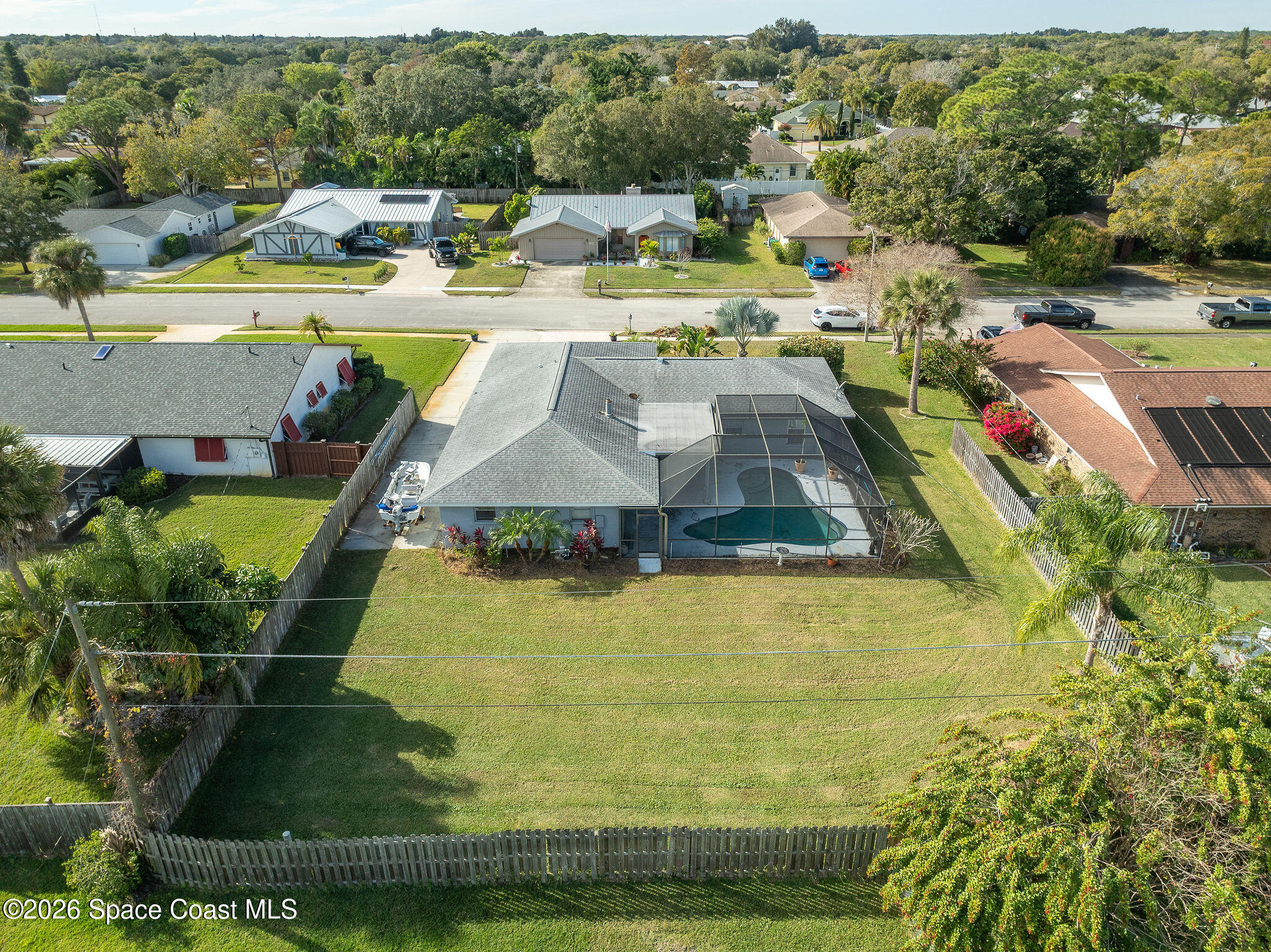 2623 Reed Avenue Melbourne, FL 32901 - Photo 34 of 45 a view of a swimming pool with a patio