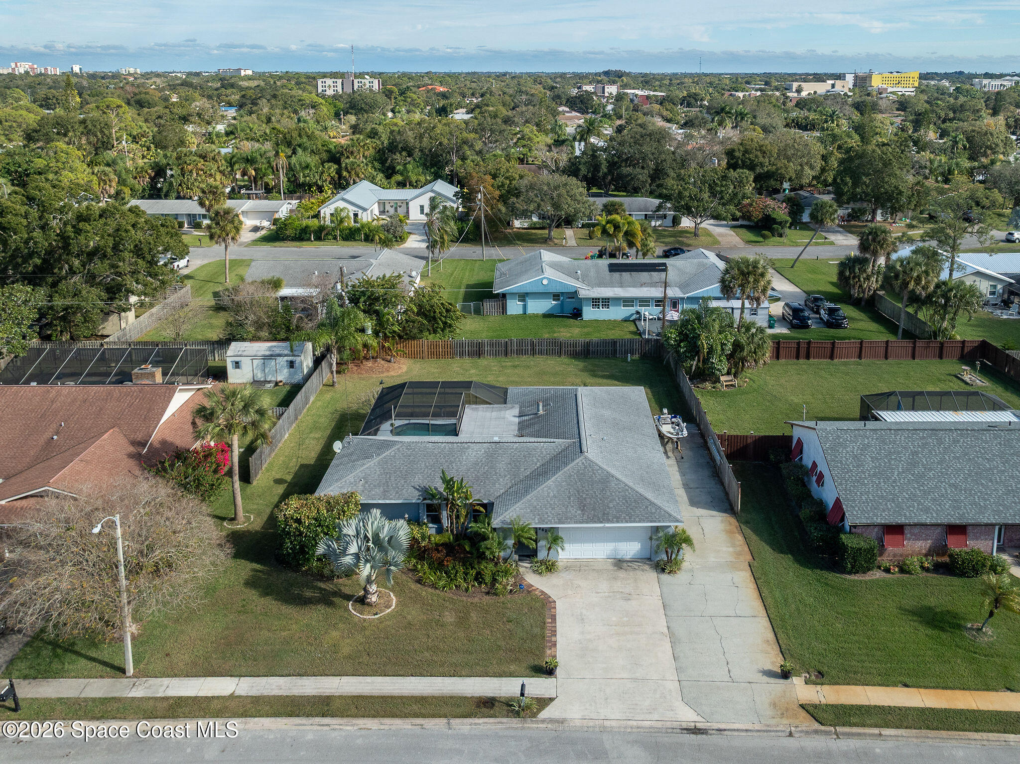 2623 Reed Avenue Melbourne, FL 32901 - Photo 35 of 45 an aerial view of a house with a yard basket ball court and outdoor seating